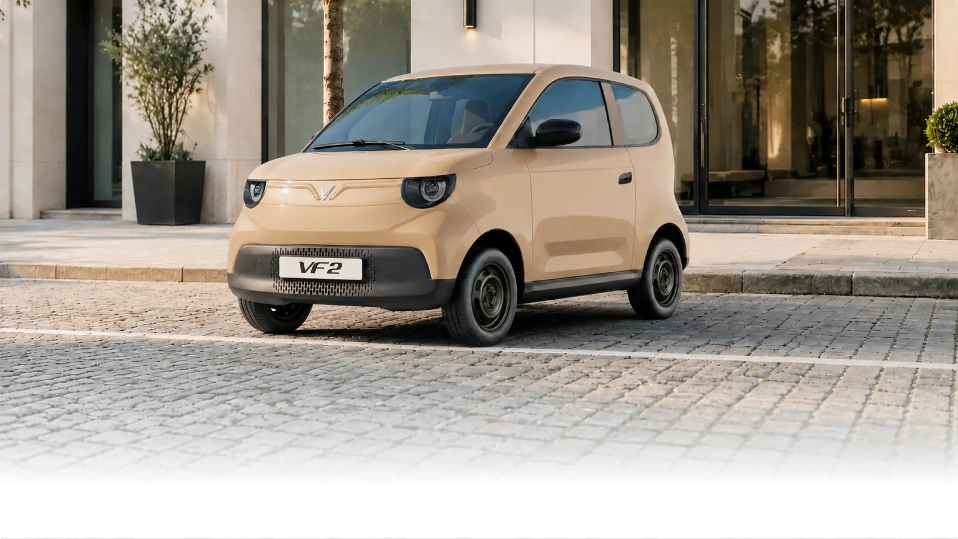 VinFast VF 2 màu Pebble Beige trong không gian đô thị